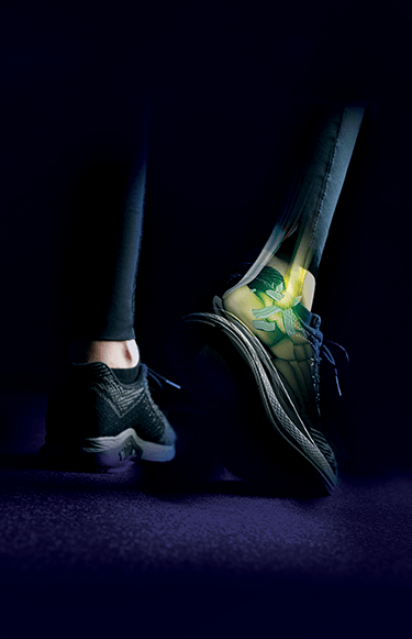 Runner lacing up a shoe